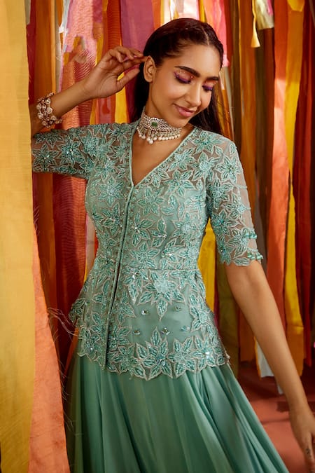 Label Sanya Gulati_Green Net, Georgette, Linen Beads V-neck Floral Embroidered Peplum Top Skirt Set _at_Aza_Fashions