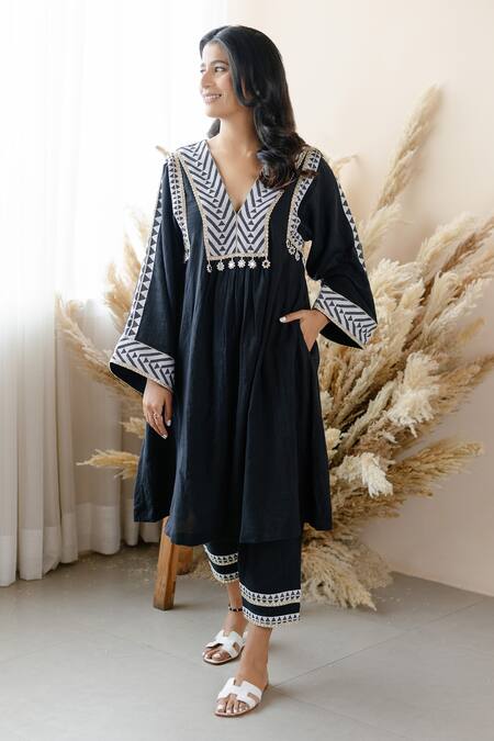 Shop Seeaash Black Cotton Mirrors, Pearls V-neck Border Printed A-line Kurta And Pant Set Online at Aza Fashions Shop_Seeaash_Black Cotton Mirrors, Pearls V-neck Border Printed A-line Kurta And Pant Set_Online_at_Aza_Fashions