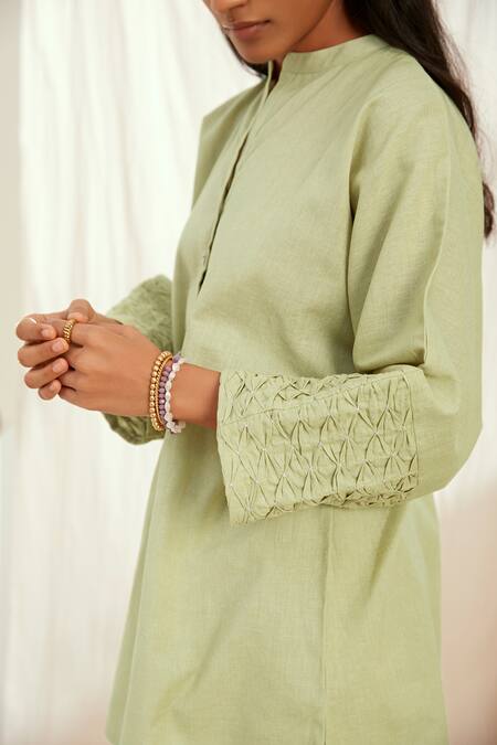 The Right Cut_Green Linen Round Neck Ezili Diamond Smocked Top And Narrow Pant Set_at_Aza_Fashions
