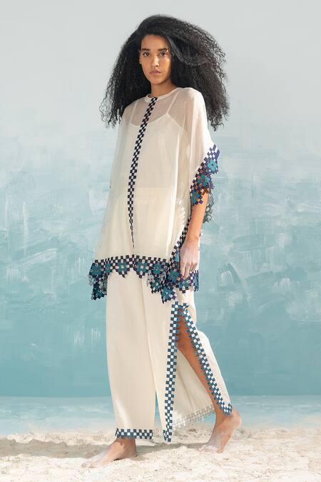 Shop_Ikai By Ragini Ahuja_Ivory Cotton, Silk Applique, Cut Work Round Neck Nile Table Mat Top_Online_at_Aza_Fashions