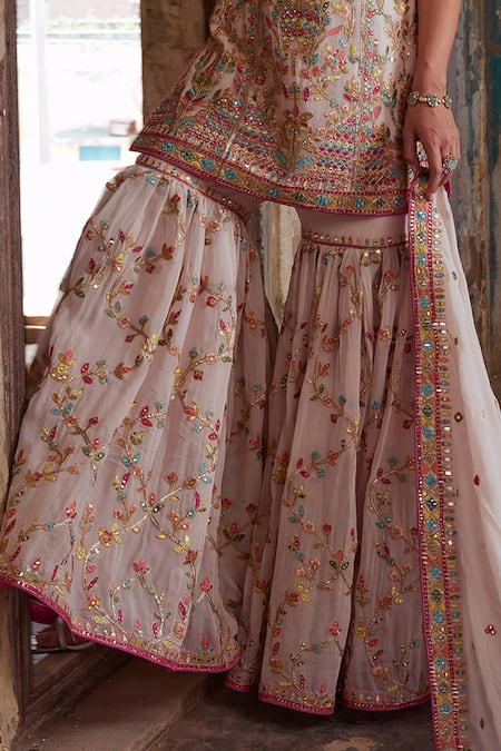 Tamanna Punjabi Kapoor Pink Net, Crepe Embroidery, Diamonds Halter Neck Resham Kurta Gharara Set Online at Aza Fashions Tamanna Punjabi Kapoor_Pink Net, Crepe Embroidery, Diamonds Halter Neck Resham Kurta Gharara Set _Online_at_Aza_Fashions