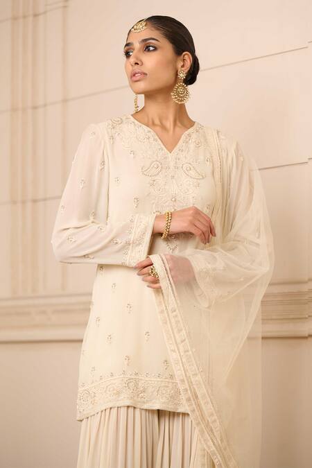 Tarun Tahiliani_Ivory Georgette Beads, Embroidery Boat Neck Chikankari Short Kurta Sharara Set_at_Aza_Fashions