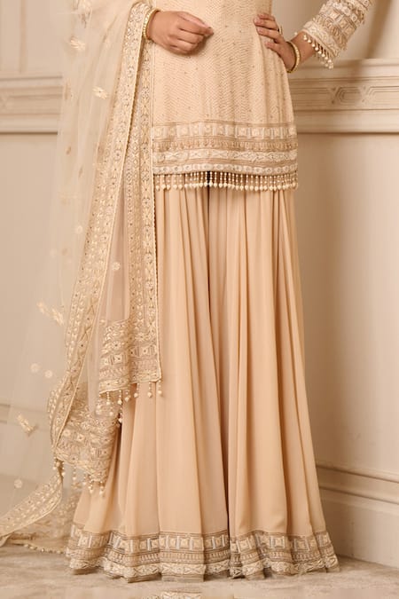 Shop_Tarun Tahiliani_Gold Georgette, Tulle Tassels, Embroidery Split V-neck Hand Kurta Sharara Set_Online_at_Aza_Fashions