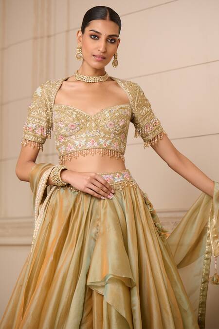 Buy Tarun Tahiliani Gold Organza Stones, Tassels, Embroidery Sweetheart Neck Floral Lehenga Set Online at Aza Fashions Buy_Tarun Tahiliani_Gold Organza Stones, Tassels, Embroidery Sweetheart Neck Floral Lehenga Set_Online_at_Aza_Fashions