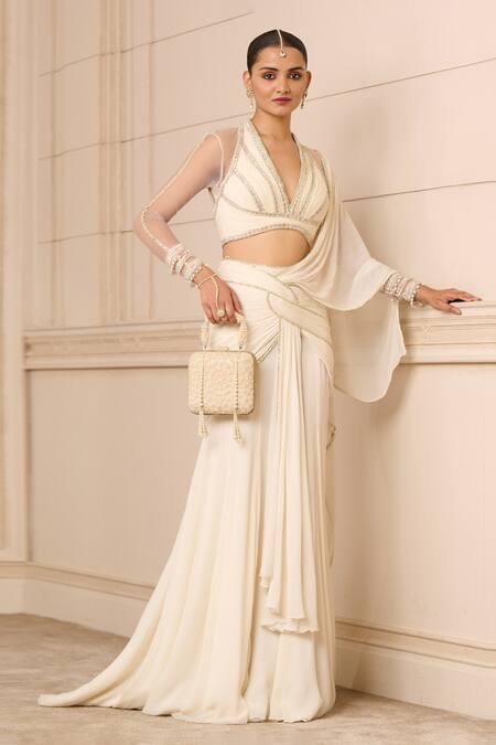 Buy Tarun Tahiliani Ivory Silk, Chiffon Embroidery Concept Pre-draped Saree With Fluted Blouse Online at Aza Fashions Buy_Tarun Tahiliani_Ivory Silk, Chiffon Embroidery Concept Pre-draped Saree With Fluted Blouse_Online_at_Aza_Fashions