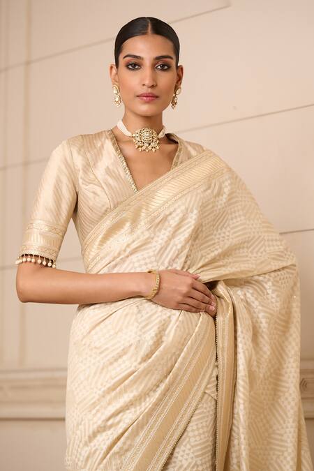 Tarun Tahiliani_Gold Chanderi, Brocade Tassels, Zari Saree With Unstitched Blouse Piece_Online_at_Aza_Fashions