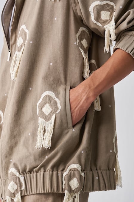 Three Green Handloom Cotton Fringe Handwoven Bomber Jacket at Aza Fashions Three_Green Handloom Cotton Fringe Handwoven Bomber Jacket_at_Aza_Fashions