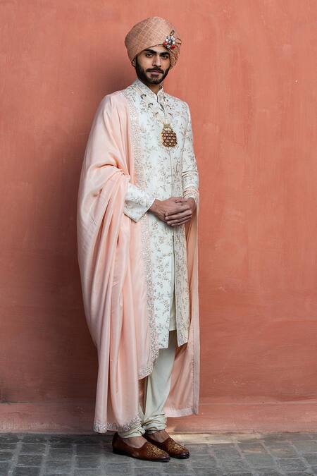 Nitika Gujral Ivory Silk, Mohair, Cotton Embroidery Raw Floral Sherwani Set Online at Aza Fashions Nitika Gujral_Ivory Silk, Mohair, Cotton Embroidery Raw Floral Sherwani Set _Online_at_Aza_Fashions