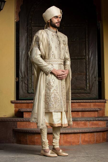 Nitika Gujral_Gold Achkan Twill Weave Matka Embroidery Dabka Mirrors Flower Motif Set _Online_at_Aza_Fashions
