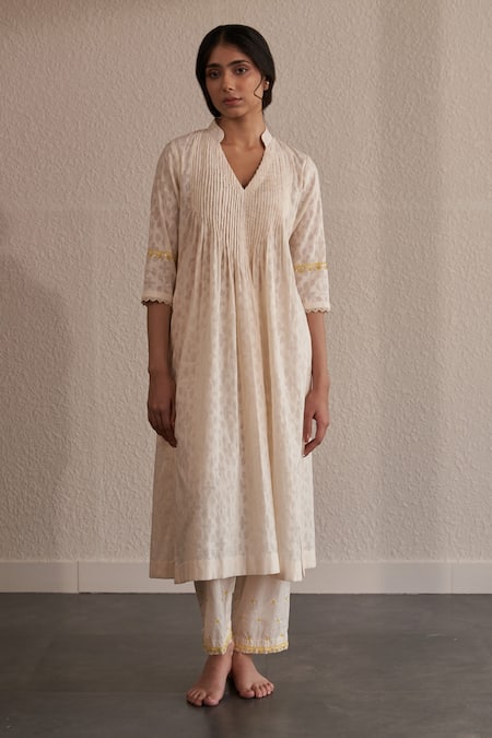 Label Mansi Nagdev Off White Cotton, Muslin Beads, Embroidery V-neck Urja Pintucked Yoke Kurta Set Online at Aza Fashions Label Mansi Nagdev_Off White Cotton, Muslin Beads, Embroidery V-neck Urja Pintucked Yoke Kurta Set _Online_at_Aza_Fashions