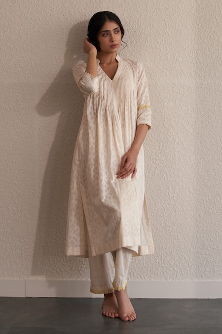 Buy Label Mansi Nagdev Off White Cotton, Muslin Beads, Embroidery V-neck Urja Pintucked Yoke Kurta Set Online at Aza Fashions Buy_Label Mansi Nagdev_Off White Cotton, Muslin Beads, Embroidery V-neck Urja Pintucked Yoke Kurta Set _Online_at_Aza_Fashions