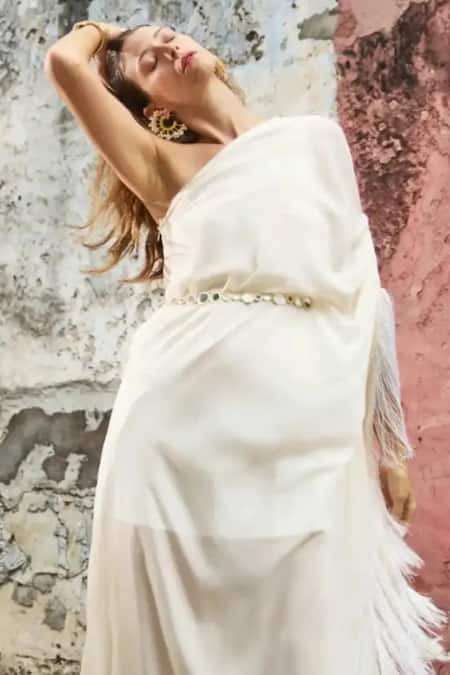 Style Junkiie Ivory Crepe Fringe Asymmetric One Shoulder Kaftan at Aza Fashions Style Junkiie_Ivory Crepe Fringe Asymmetric One Shoulder Kaftan _at_Aza_Fashions