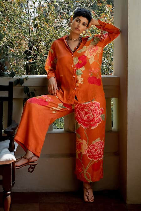 Paulmi And Harsh Orange Crepe Tassels Collared Blissful Floral Print Shirt And Pant Co-ord Set Online at Aza Fashions Paulmi And Harsh_Orange Crepe Tassels Collared Blissful Floral Print Shirt And Pant Co-ord Set _Online_at_Aza_Fashions