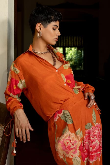 Shop Paulmi And Harsh Orange Crepe Tassels Collared Blissful Floral Print Shirt And Pant Co-ord Set Online at Aza Fashions Shop_Paulmi And Harsh_Orange Crepe Tassels Collared Blissful Floral Print Shirt And Pant Co-ord Set _Online_at_Aza_Fashions
