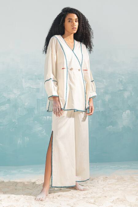 Buy_Ikai by Ragini Ahuja_Ivory Cotton Applique, Cut Work V-neck Nile Overlap Wrap Top _Online_at_Aza_Fashions