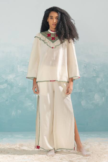 Buy Ikai By Ragini Ahuja Ivory Cotton Applique, Cut Work High Neck Nile Yoke Cut-work Top Online at Aza Fashions Buy_Ikai By Ragini Ahuja_Ivory Cotton Applique, Cut Work High Neck Nile Yoke Cut-work Top_Online_at_Aza_Fashions