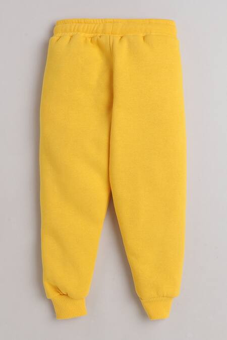Knitting Doodles_Yellow Fleece Printed Aeroplane Jacket And Joggers Set_at_Aza_Fashions