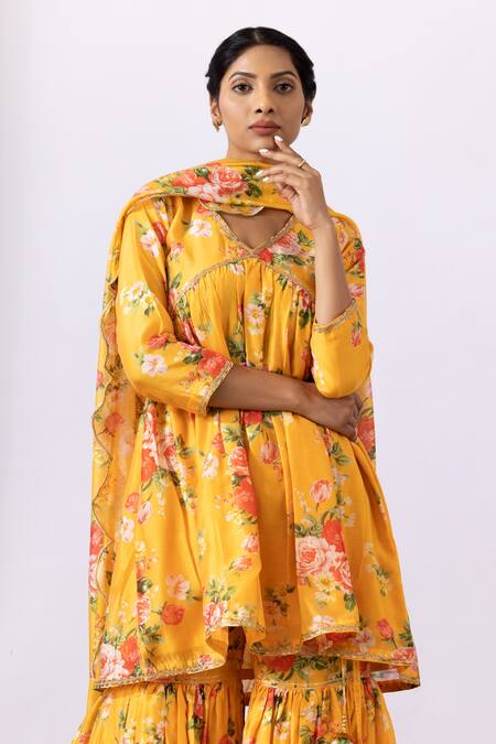 Abbaran Yellow Chanderi Tassels, Embroidery V-neck Floral Printed Kurta Gharara Set at Aza Fashions Abbaran_Yellow Chanderi Tassels, Embroidery V-neck Floral Printed Kurta Gharara Set_at_Aza_Fashions