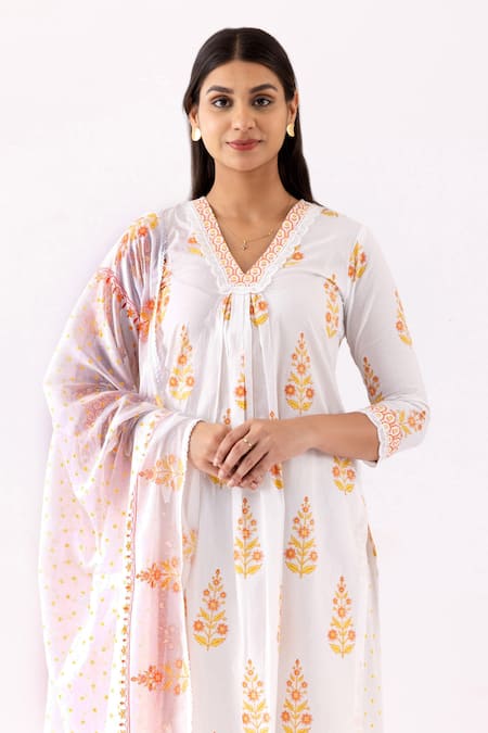 Abbaran_Ivory Cotton, Muslin Embroidery V-neck Block Print A-line Kurta Set_at_Aza_Fashions