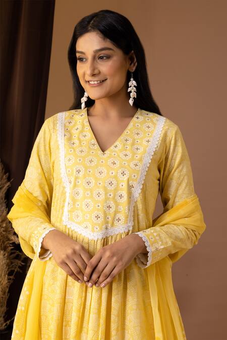 Abbaran_Yellow Cotton Lace, Sequins V-neck Bloom Print Kurta Palazzo Set _at_Aza_Fashions