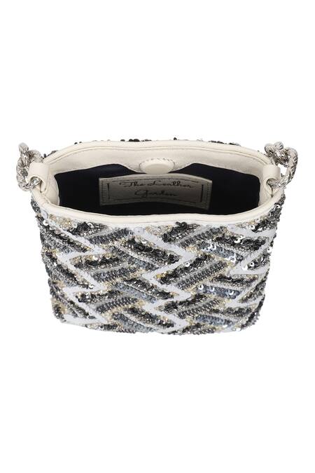 Shop_The Leather Garden_Silver Sequin Zinnia Leather Embellished Potli Bag _Online_at_Aza_Fashions