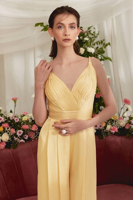 Zosia Yellow Luxury Crushed Satin Plunge V Hestia Pleated Jumpsuit at Aza Fashions Zosia_Yellow Luxury Crushed Satin Plunge V Hestia Pleated Jumpsuit_at_Aza_Fashions