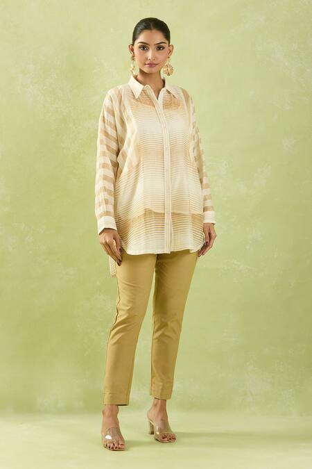 Shraddha Rambhia_Ivory Fine Chanderi Woven Stripe Collar Tunic_at_Aza_Fashions