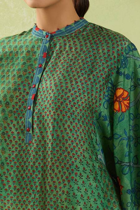 Shraddha Rambhia Green Silk Embroidery Mandarin Collar Floral Butta Print Slub Top at Aza Fashions Shraddha Rambhia_Green Silk Embroidery Mandarin Collar Floral Butta Print Slub Top_at_Aza_Fashions