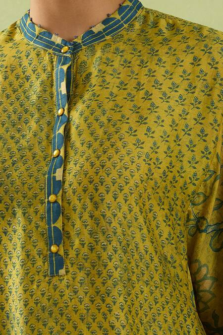 Shraddha Rambhia Yellow Silk Mandarin Collar Garden Print Mustard Top at Aza Fashions Shraddha Rambhia_Yellow Silk Mandarin Collar Garden Print Mustard Top_at_Aza_Fashions