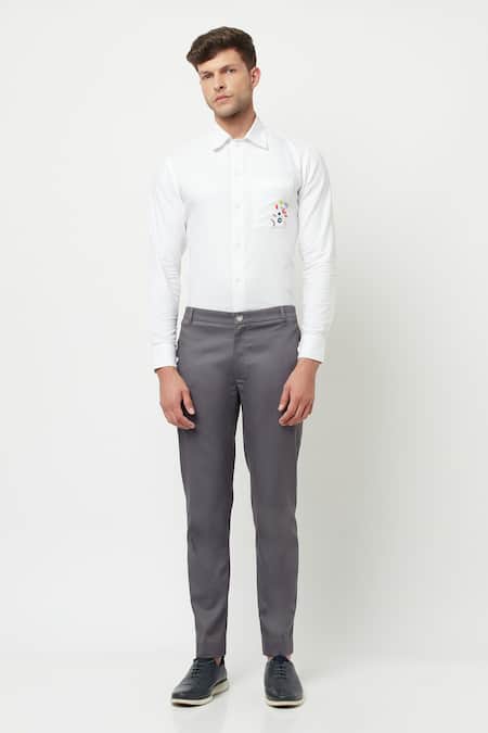 Gray-haired Male in White Shirt, Brown Pants and Suspenders, Black Loafers.  he is Jumping Up, Posing on Blue Studio Background Stock Photo - Image of  hands, people: 177955830