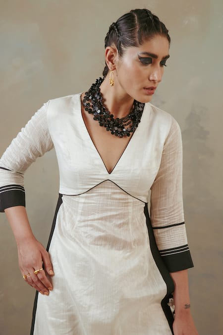 Buy Sureena Chowdhri White Tissue Embroidered Thread Work V Neck Contrast Hem Kurta Gharara Set Online at Aza Fashions Buy_Sureena Chowdhri_White Tissue Embroidered Thread Work V Neck Contrast Hem Kurta Gharara Set_Online_at_Aza_Fashions