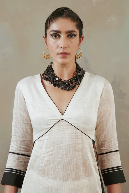 Shop Sureena Chowdhri White Tissue Embroidered Thread Work V Neck Contrast Hem Kurta Gharara Set Online at Aza Fashions Shop_Sureena Chowdhri_White Tissue Embroidered Thread Work V Neck Contrast Hem Kurta Gharara Set_Online_at_Aza_Fashions