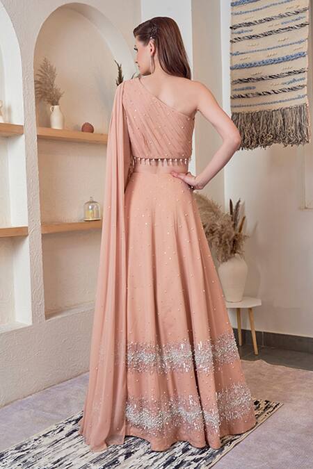 Shop_Jade By Ashima_Peach Georgette Sequin, Pearl And Beads One Shoulder Crop Top & Skirt Set _at_Aza_Fashions