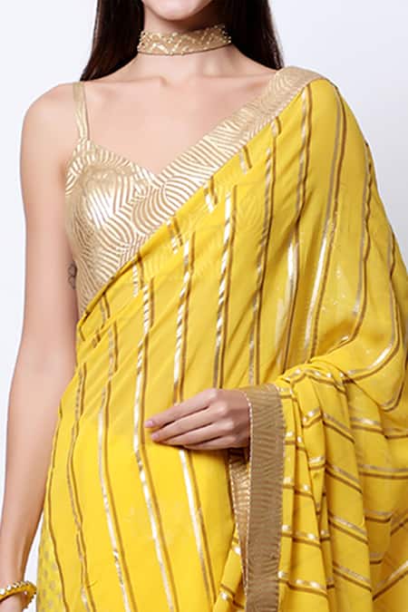 Nikasha_Yellow Crepe Sweetheart Neck Embroidered Saree With Blouse _Online_at_Aza_Fashions