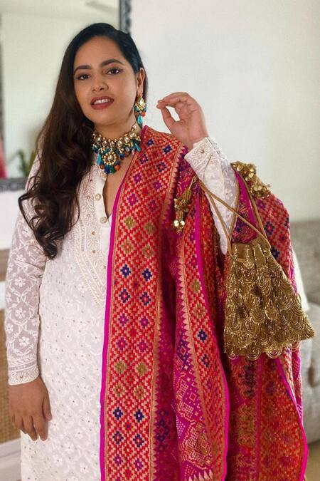 Buy Ara Studio Gold Embroidered Layered Tassel Potli Bag at Aza Fashions Buy_Ara Studio_Gold Embroidered Layered Tassel Potli Bag_at_Aza_Fashions