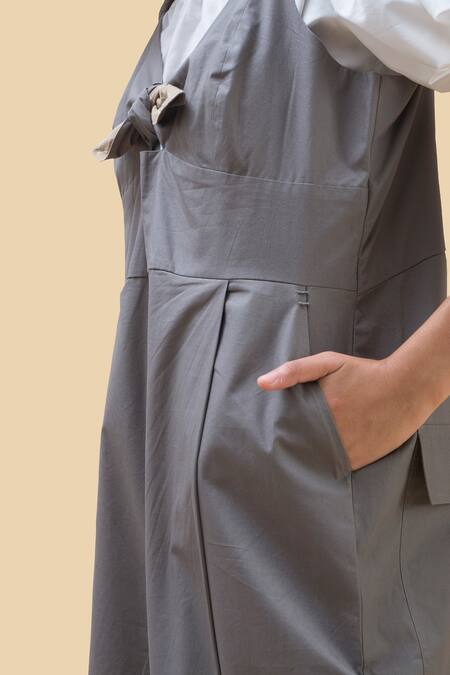 Chillosophy Grey Poplin V Neck Jumpsuit With Front Knot at Aza Fashions Chillosophy_Grey Poplin V Neck Jumpsuit With Front Knot _at_Aza_Fashions