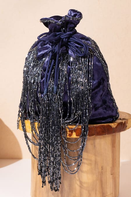 Aamli Oorvi Tassel Embellished Potli 