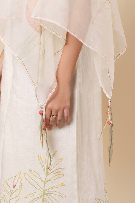 Kaveri_White Linen Leaf Print And Thread V Neck Jumpsuit_at_Aza_Fashions