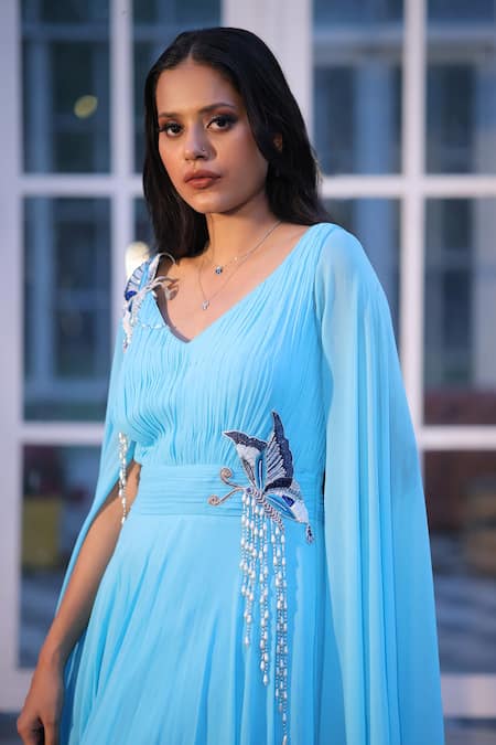 Buy House Of Tushaom Blue Georgette Embroidery Sequin Leaf Neck Cape Sleeve Draped Gown Online at Aza Fashions Buy_House Of Tushaom_Blue Georgette Embroidery Sequin Leaf Neck Cape Sleeve Draped Gown _Online_at_Aza_Fashions