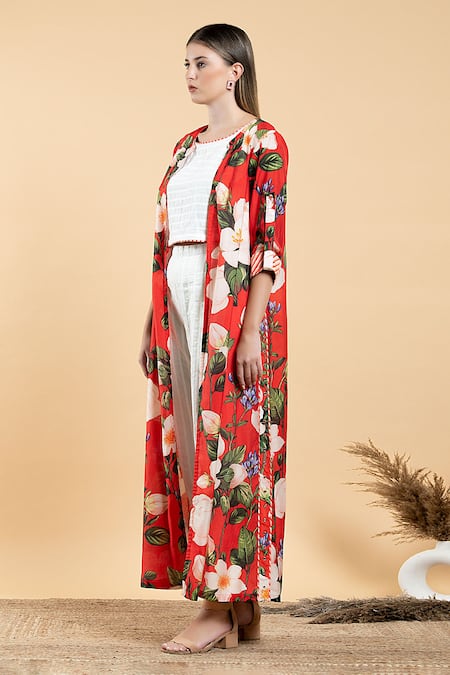 Shop Divi By Sonal Khandelwal Red Muslin, Cotton Boat Neck Wild Rose Print Cape And White Pant Set Online at Aza Fashions Shop_Divi By Sonal Khandelwal_Red Muslin, Cotton Boat Neck Wild Rose Print Cape And White Pant Set _Online_at_Aza_Fashions