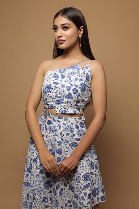Shop Ahi Clothing White Cotton Block Print One Shoulder Asymmerical Flower Top And Skirt Set at Aza Fashions Shop_Ahi Clothing_White Cotton Block Print One Shoulder Asymmerical Flower Top And Skirt Set_at_Aza_Fashions
