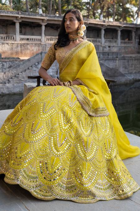 Pretty yellow lehenga with red dupatta for an engagement. See more on  wedmegood.com #wedmegood #i… | Indian wedding fashion, Indian wedding  gowns, Ceremony dresses