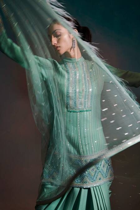 Anjali Kanwar Green Net, Pure Georgette Sequin Mandarin Embroidered Kurta Draped Skirt Set at Aza Fashions Anjali Kanwar_Green Net, Pure Georgette Sequin Mandarin Embroidered Kurta Draped Skirt Set _at_Aza_Fashions
