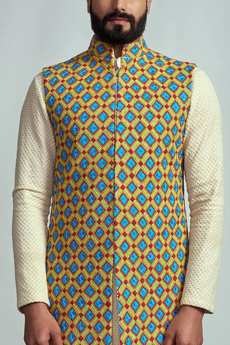Buy Arjuun Kilachand Yellow Suiting Embroidered Bundi And Kurta Set Online at Aza Fashions Buy_Arjuun Kilachand_Yellow Suiting Embroidered Bundi And Kurta Set _Online_at_Aza_Fashions