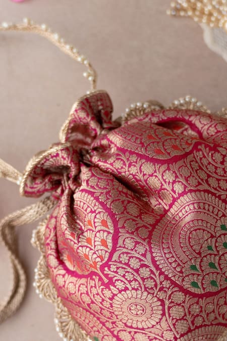 Buy_Amyra_Pink Embroidery, Lace Kashi Floral Woven Potli _Online_at_Aza_Fashions