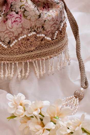Shop_AMYRA_Pink Pearls, Fringe Elora Woven Potli _Online_at_Aza_Fashions