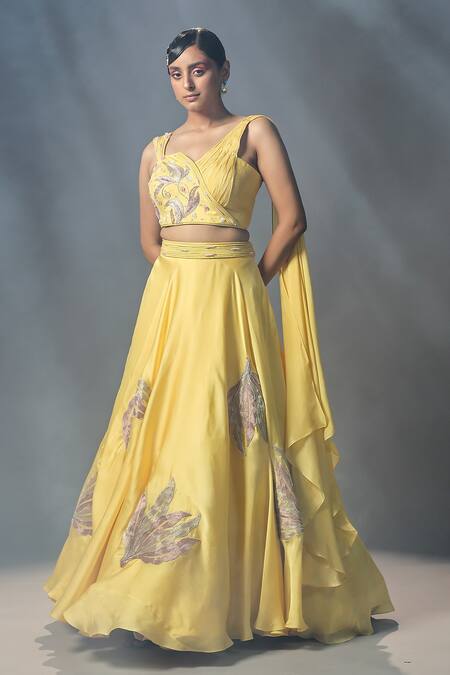 Buy_ISHA GUPTA TAYAL_Yellow Silk, Organza, Chiffon Leaf Motifs Embroidered Lehenga With Draped Blouse _Online_at_Aza_Fashions