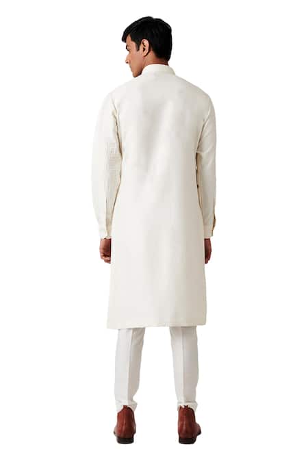 Shop Amaare White Wool Blend Asymmetric Pintuck Kurta Set at Aza Fashions Shop_Amaare_White Wool Blend Asymmetric Pintuck Kurta Set _at_Aza_Fashions