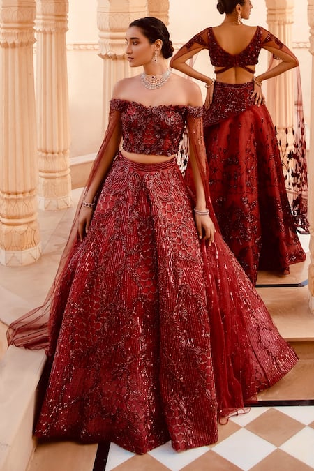 Shop Amit GT Red Tulle One Shoulder Embroidered Draped Blouse And Lehenga Set at Aza Fashions Shop_Amit GT_Red Tulle One Shoulder Embroidered Draped Blouse And Lehenga Set _at_Aza_Fashions