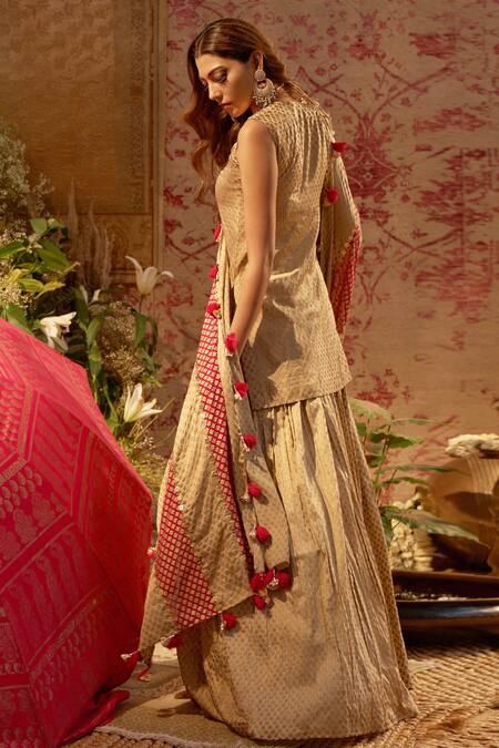 Shop Bhumika Sharma Gold Satin Crepe V Neck Printed Kurta Lehenga Set at Aza Fashions Shop_Bhumika Sharma_Gold Satin Crepe V Neck Printed Kurta Lehenga Set_at_Aza_Fashions